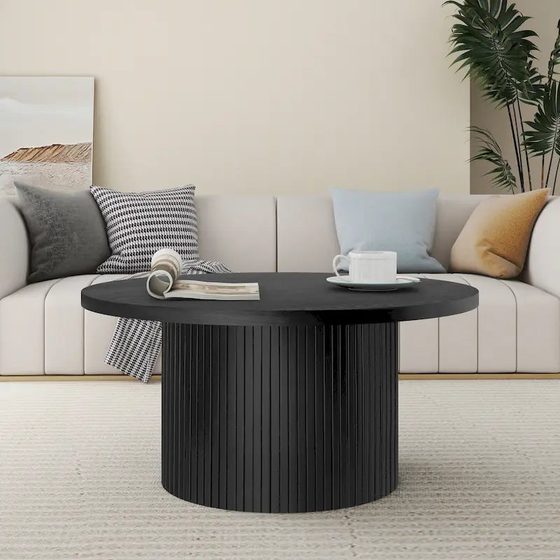 Table basse ronde Table basse sur pied cannelé