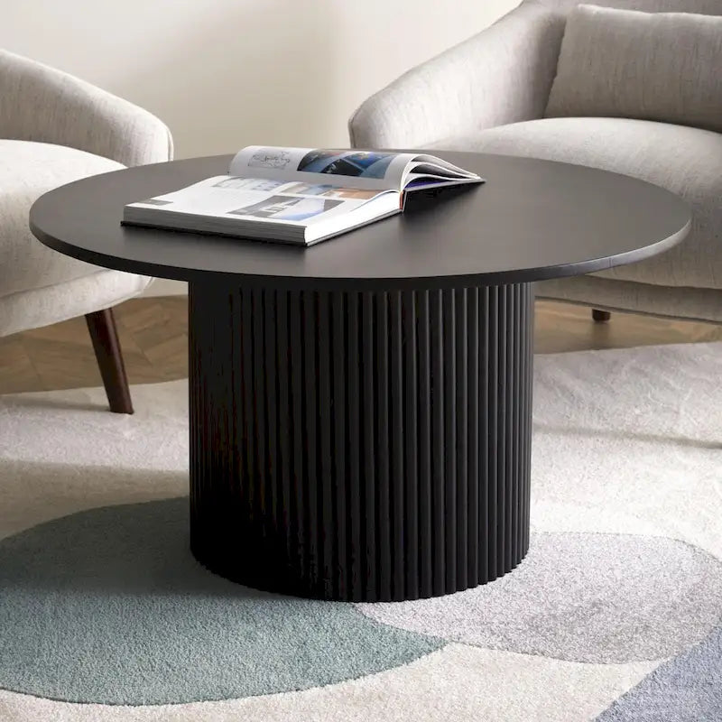 Table basse ronde Table basse sur pied cannelé