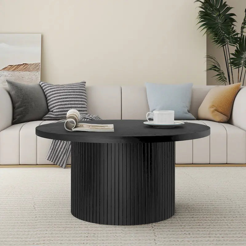 Table basse ronde Table basse sur pied cannelé