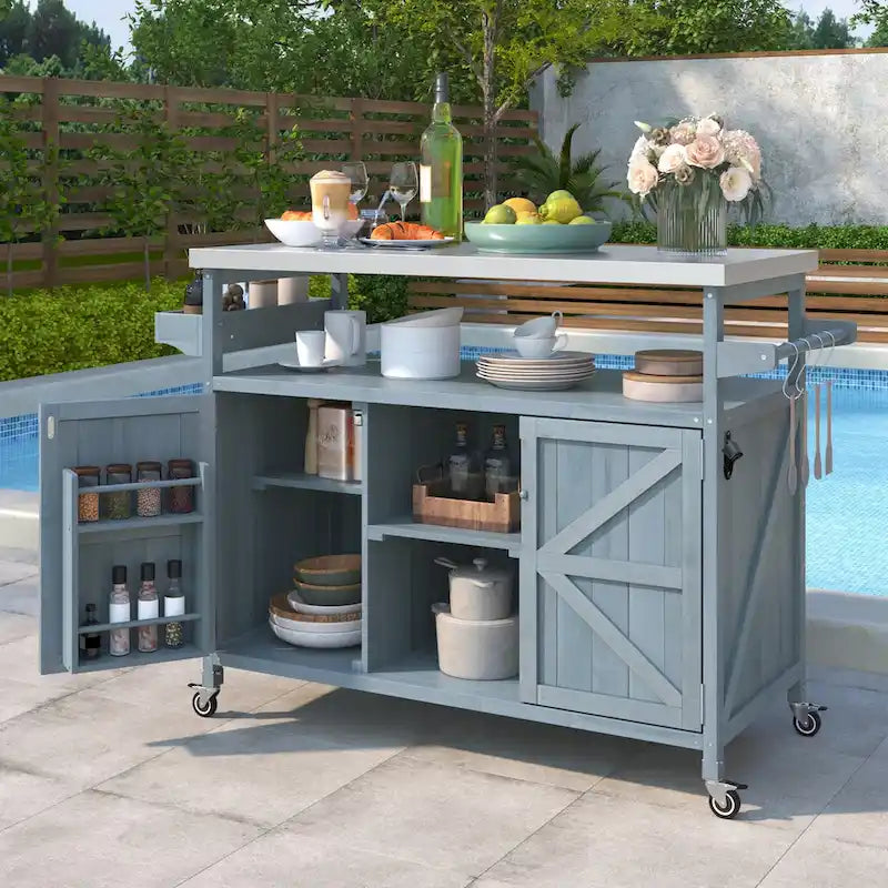 Îlot de cuisine extérieure avec chariot roulant et plateau en acier inoxydable